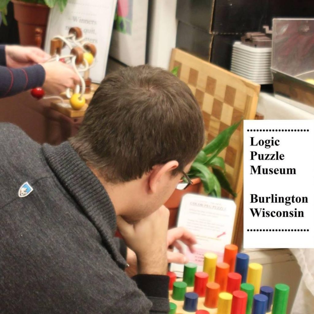 boy works on logic puzzle