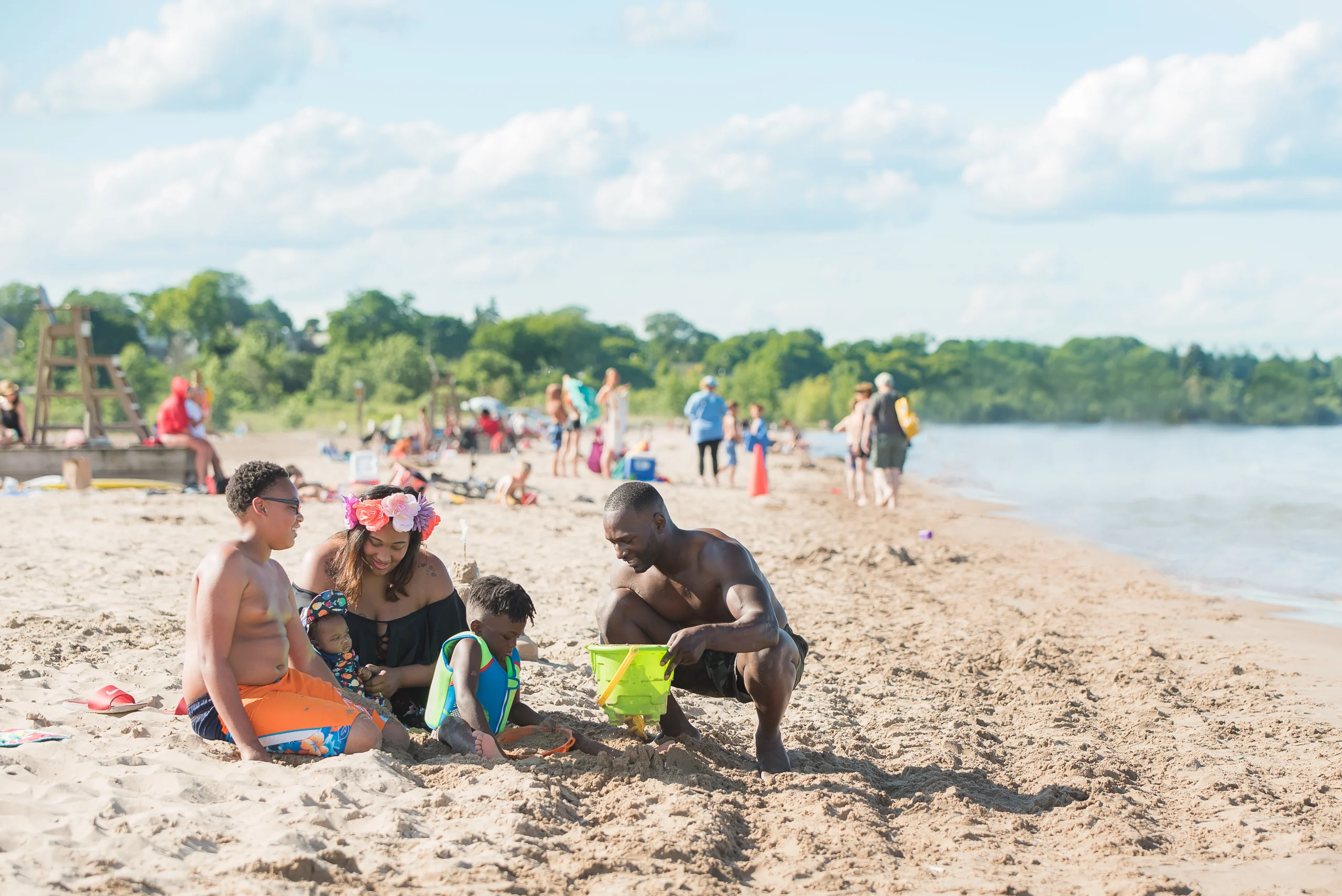 North Beach family building sand castle